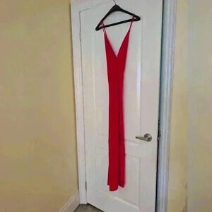 Fashion  nova red jumpsuit size M with flared pants